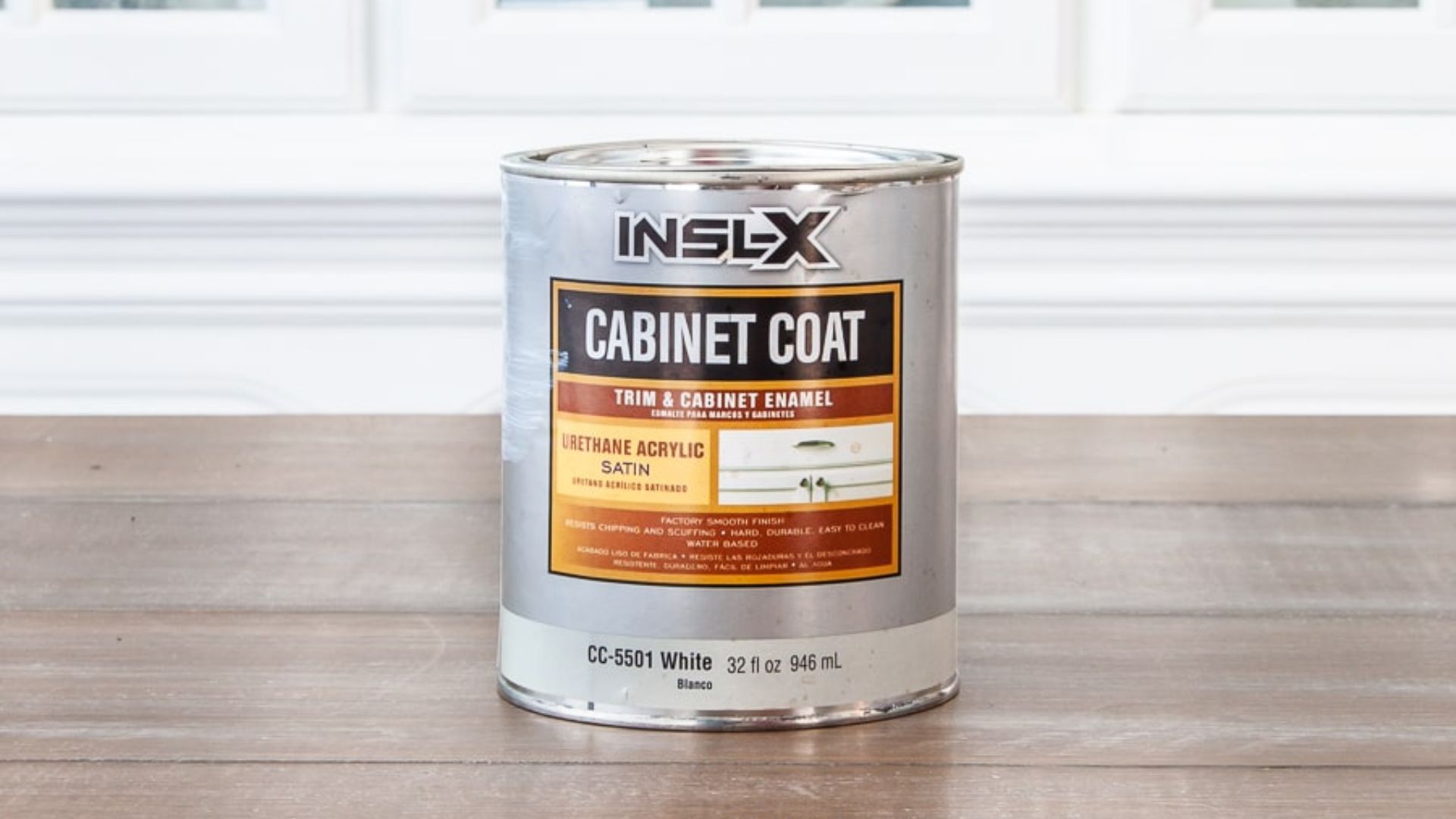A sleek innex cabinet coat displayed on a hanger, showcasing its modern design and fabric texture.