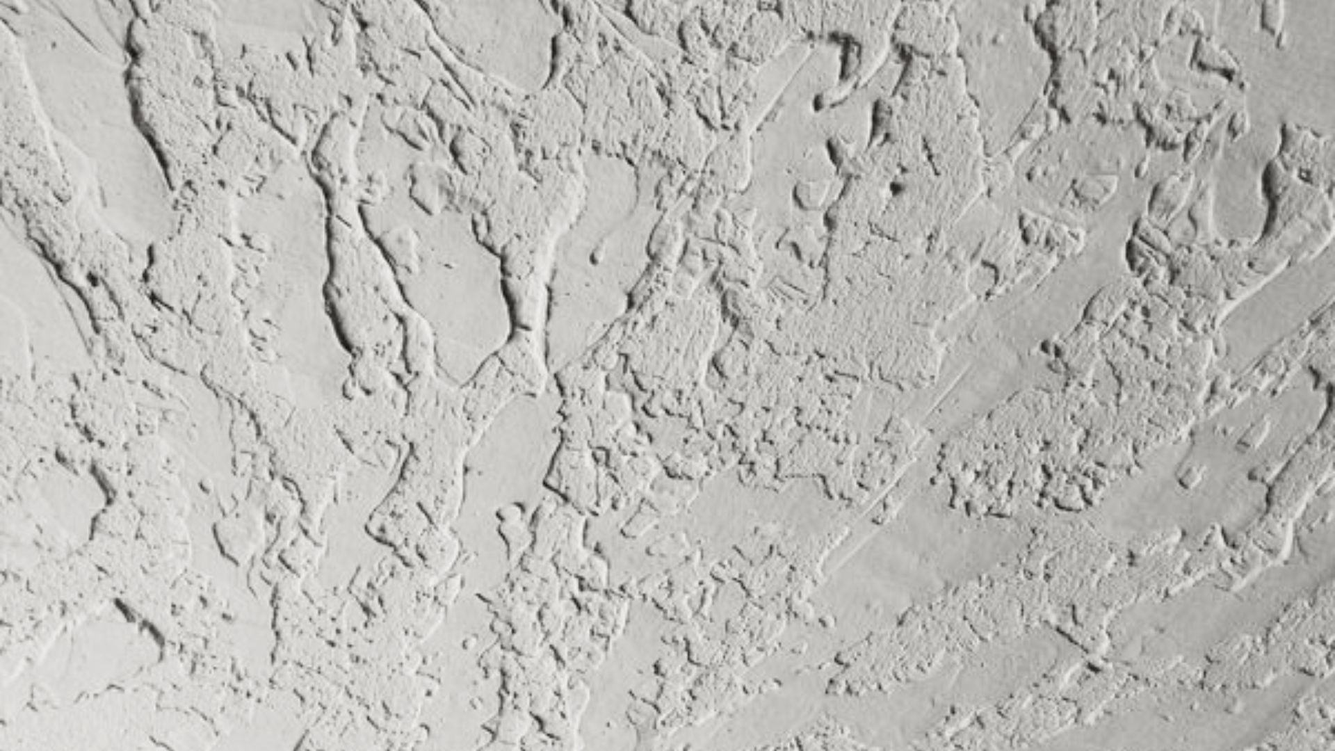 Heavy skip trowel drywall texture in off-white.