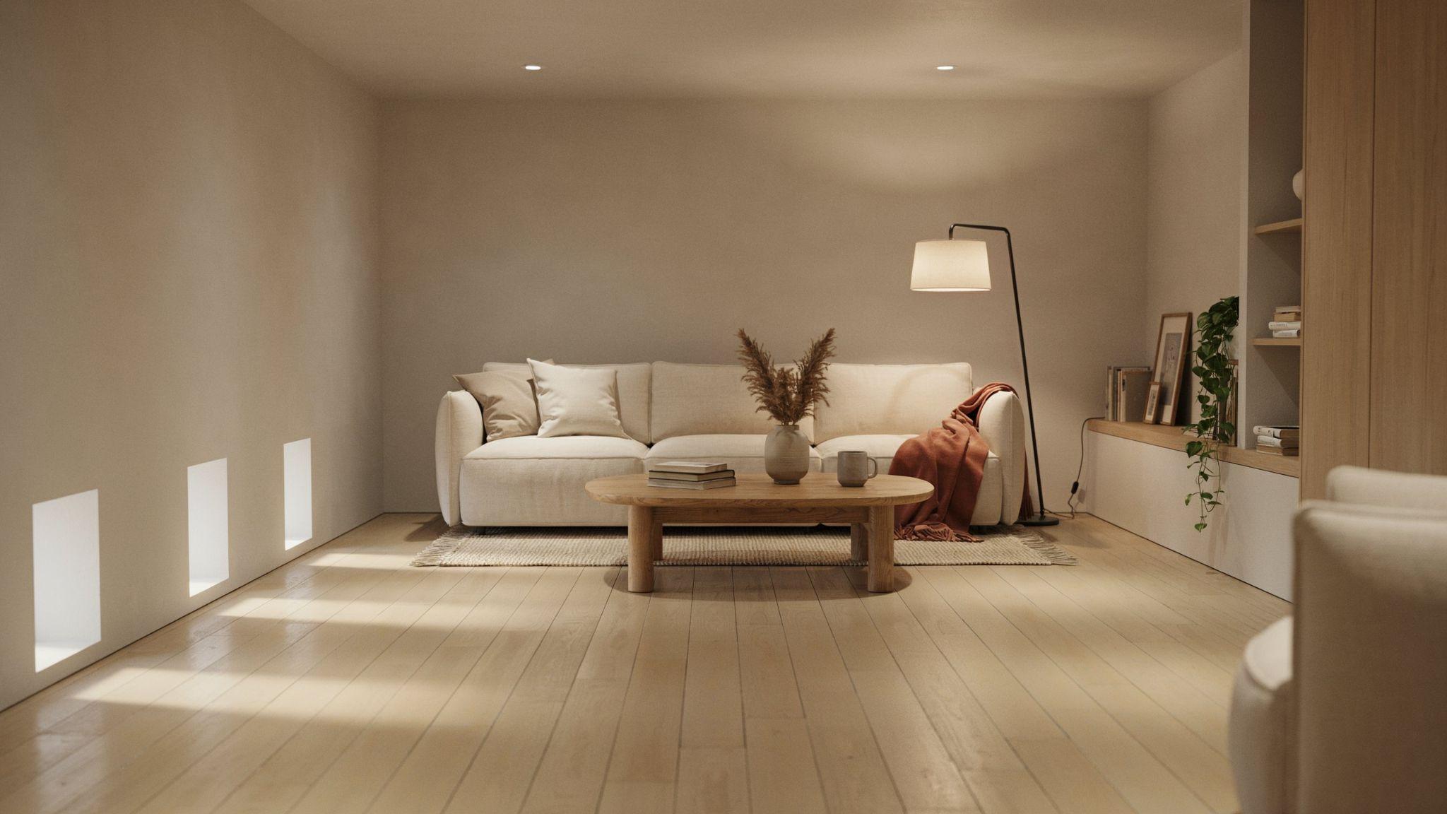 Warm modern basement interior painted in soft beige influenced by Sherwin-Williams Accessible Beige with natural wood accents and cozy neutral furnishings.