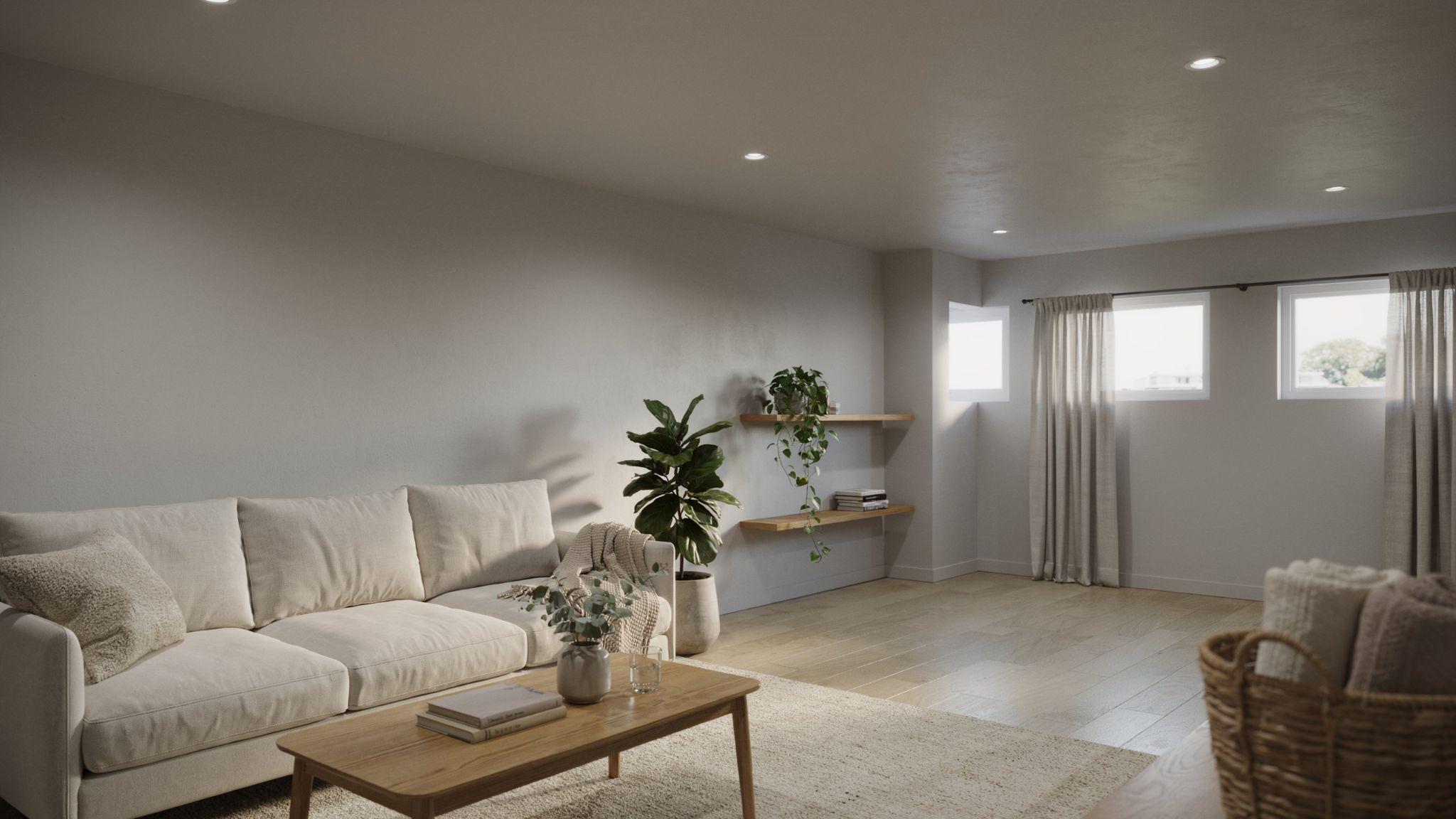 Airy modern basement interior painted in soft warm gray influenced by Behr Silver Drop with minimalist decor, natural wood accents, and cozy lighting.