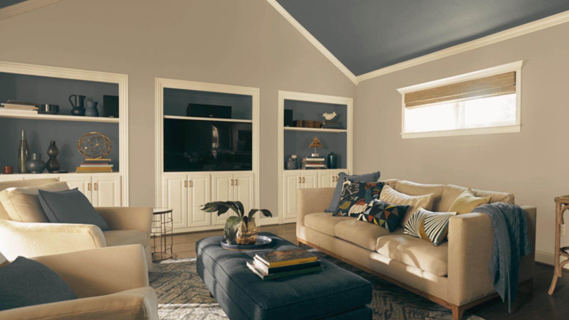 Modern living room with beige walls featuring a smooth, flat paint finish.